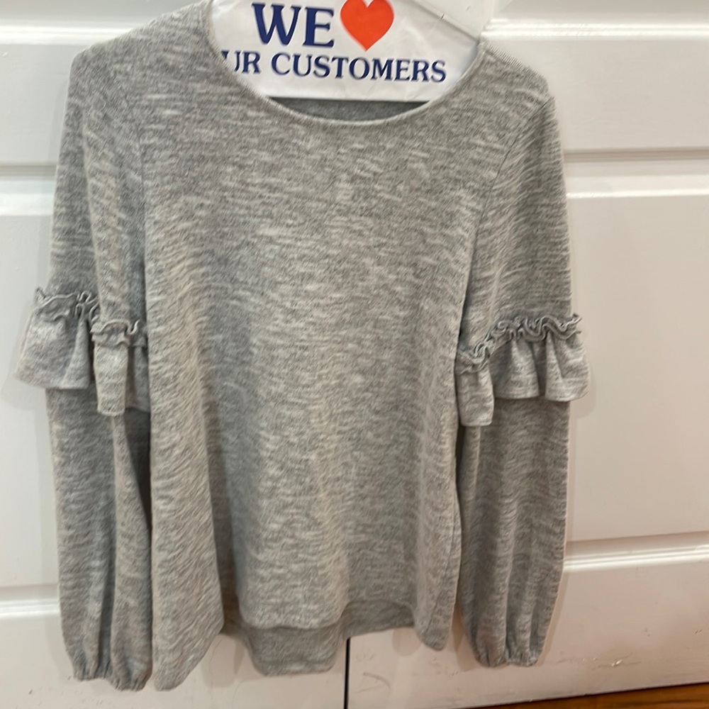 light grey sweater